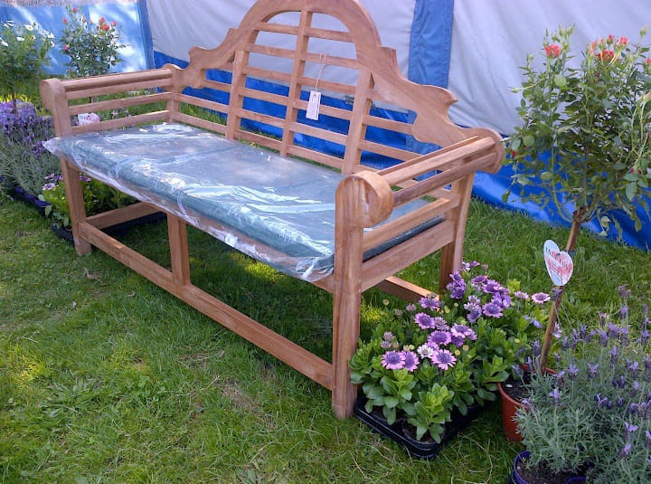 Ornate wooden garden bench