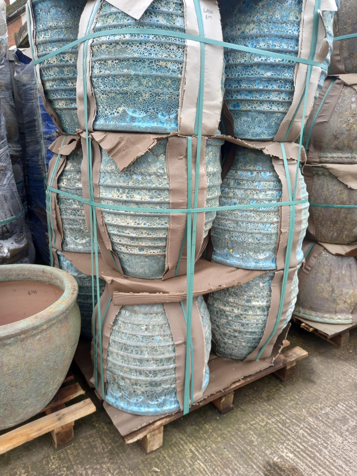 Turquoise decorative pots in various sizes