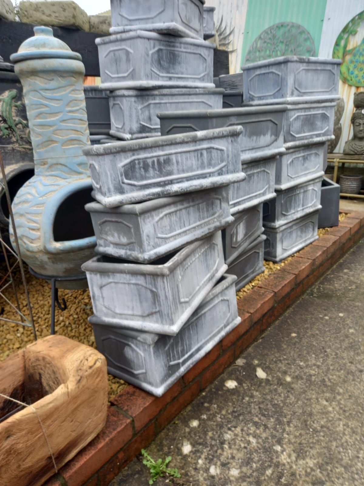Stacked decorative planters in grey finish